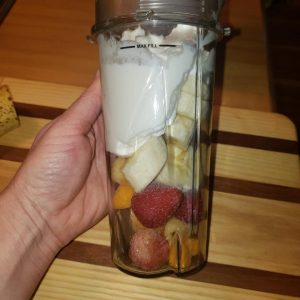 cup of ingredients for smoothie